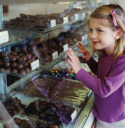 Kid admiring chocolate