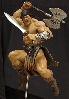 Conan action figure in mid-leap Conan action figure in mid-leap