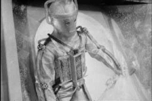 A Cyberman Emerges from Doctor Who: Tomb Of Cybermen A Cyberman Emerges from Doctor Who: Tomb Of Cybermen