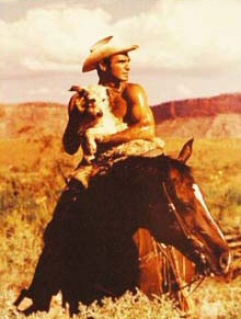 Burt Reynolds. With a puppy. On a horse. Burt Reynolds. With a puppy. On a horse.