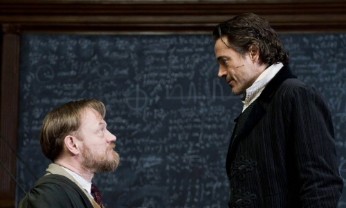 Jared Harris as Moriarty and Robert Downey Jr. as Sherlock Holmes in Sherlock Holmes: A Game of Shadows Jared Harris as Moriarty and Robert Downey Jr. as Sherlock Holmes in Sherlock Holmes: A Game of Shadows